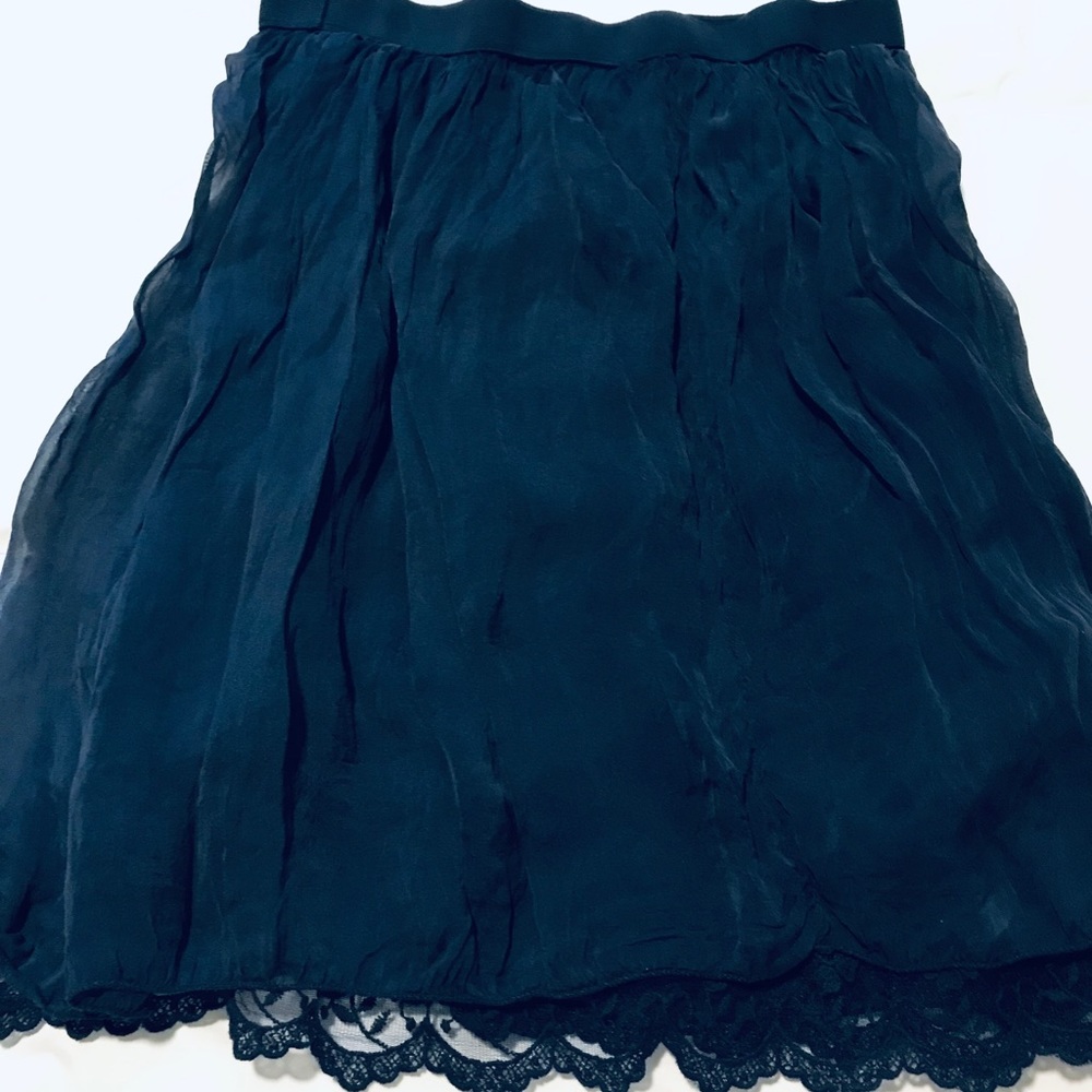 Navy blue mid skirt. Lace underlay